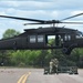 Soldiers with 13th Battalion, 100th Regiment hold slingload training at McCoy, Wisconsin National Guard Black Hawks, crews assist