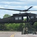 Soldiers with 13th Battalion, 100th Regiment hold slingload training at McCoy, Wisconsin National Guard Black Hawks, crews assist