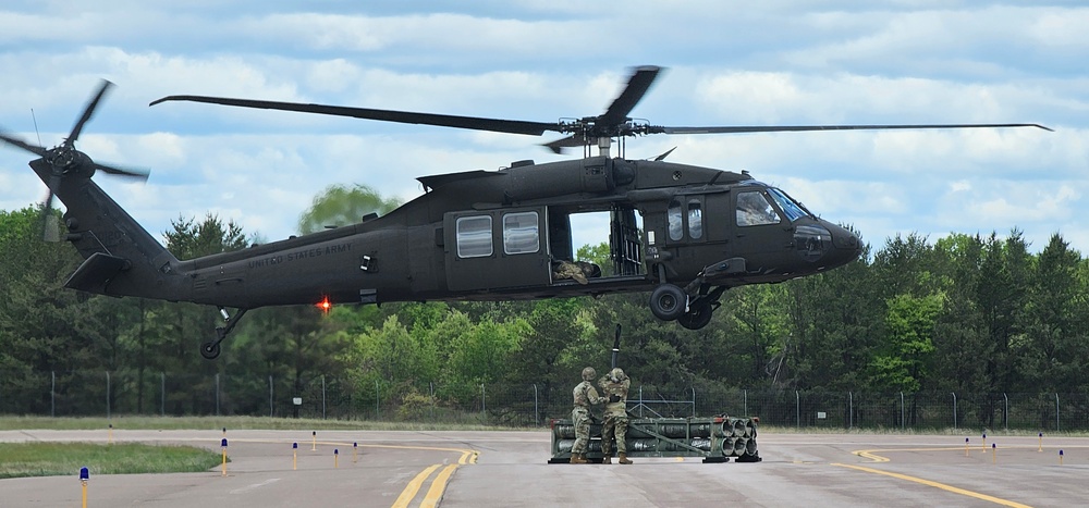 Soldiers with 13th Battalion, 100th Regiment hold slingload training at McCoy, Wisconsin National Guard Black Hawks, crews assist