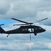 Soldiers with 13th Battalion, 100th Regiment hold slingload training at McCoy, Wisconsin National Guard Black Hawks, crews assist
