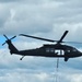 Soldiers with 13th Battalion, 100th Regiment hold slingload training at McCoy, Wisconsin National Guard Black Hawks, crews assist