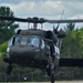 Soldiers with 13th Battalion, 100th Regiment hold slingload training at McCoy, Wisconsin National Guard Black Hawks, crews assist