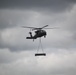Soldiers with 13th Battalion, 100th Regiment hold slingload training at McCoy, Wisconsin National Guard Black Hawks, crews assist