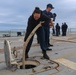 U.S. Navy #wolfpack Sailors lower the aft mooring line into storage
