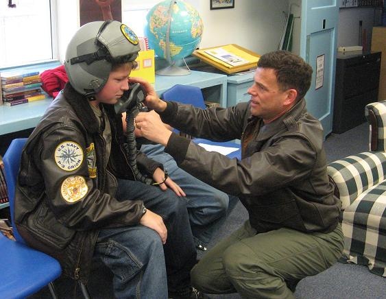 Igniting Dreams: Commander Malloy Inspires Young Michael Hayward at Dahlgren School in 2009