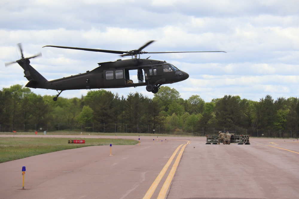 Soldiers with 13th Battalion, 100th Regiment hold slingload training at McCoy, Wisconsin National Guard Black Hawks, crews assist