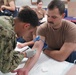 Naval Medical Readiness Training Command Rota Projects Global Medical Strength Aboard USS Stout (DDG 55)