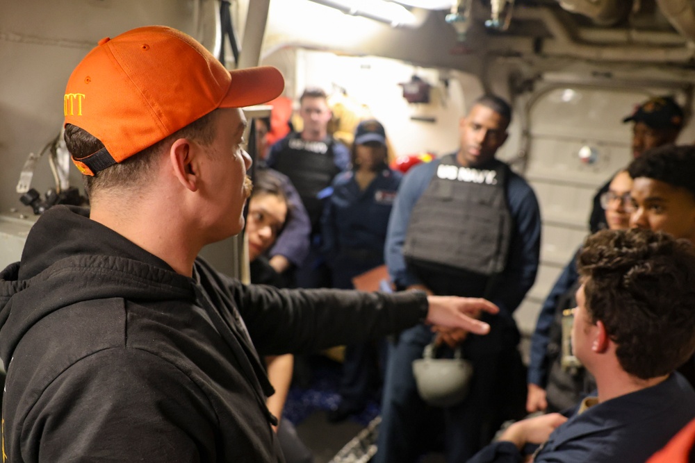 IT1 William O’Neill provides training feedback after a simulated active shooter and hostage scenario