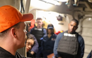 IT1 William O’Neill provides training feedback after a simulated active shooter and hostage scenario