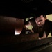 Sailor Conducts Routine Maintenance