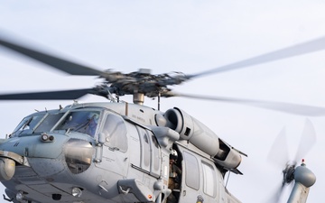 USS America (LHA 6) conducts flight operations
