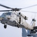USS America (LHA 6) conducts flight operations