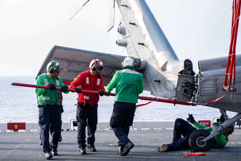 USS America (LHA 6) conducts flight operations