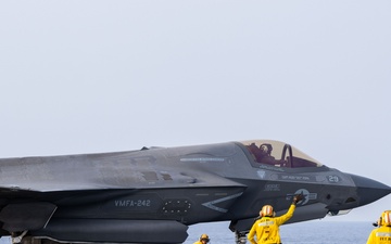 USS America (LHA 6) conducts flight operations