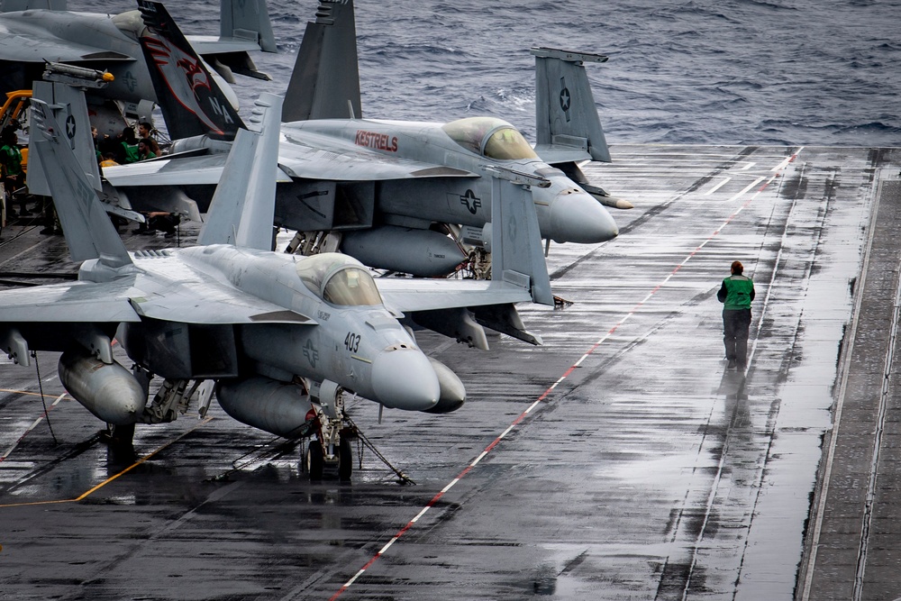 Nimitz Sailor Transits the Flight Deck