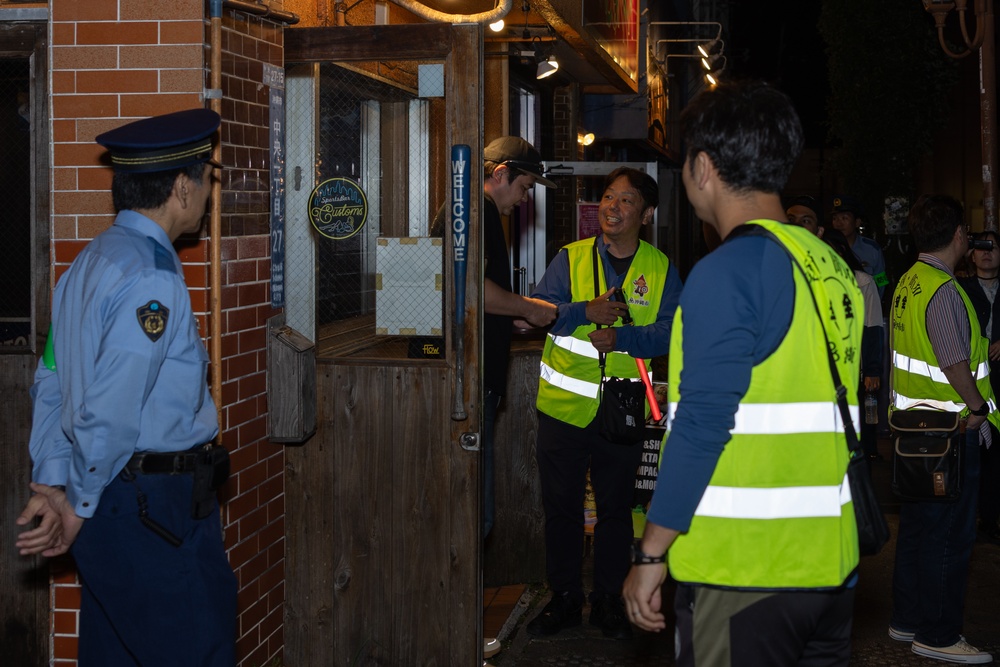 U.S. military police partner with Japanese police to conduct a Joint Law Enforcement Patrol