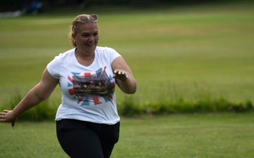 U.S. service members play cricket and softball with local nationals