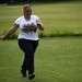 U.S. service members play cricket and softball with local nationals