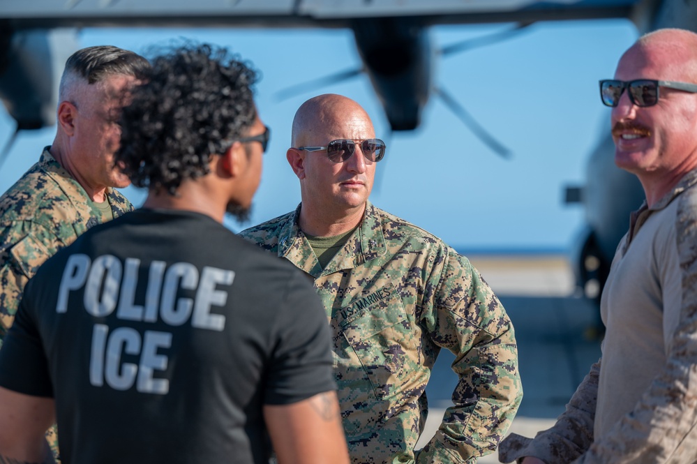 U.S. service members assist with illegal alien arrival flight