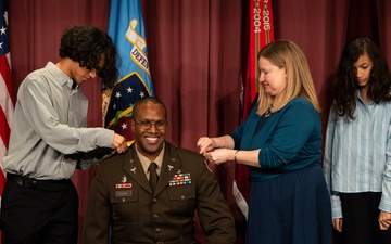 1Brig. Gen. Clinton K. Murray (left) Commanding General, United States Army Medical Center of Excellence (MEDCoE) and Chief of the U.S Army Medical Corps presided over the Promotion ceremony of BHSL Director Col. Oseola Evans with his family
