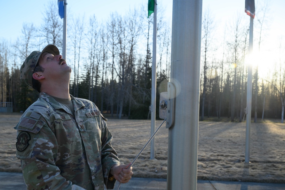 Eielson Honor Guard Raises 50 Flags