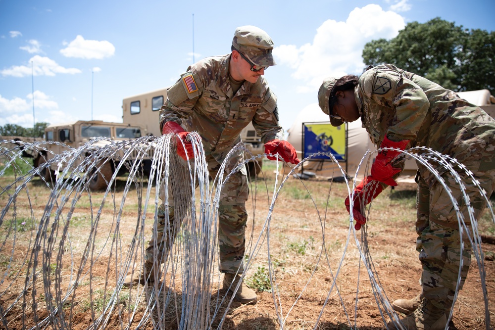 U.S. Soldiers set up wire during DEFENDER 25