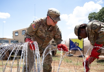 U.S. Soldiers set up wire during DEFENDER 25