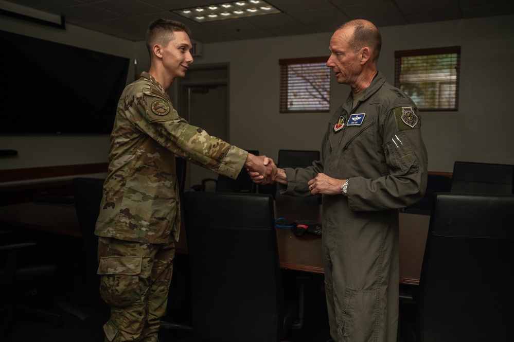 Airmen coined for exceptional customer service