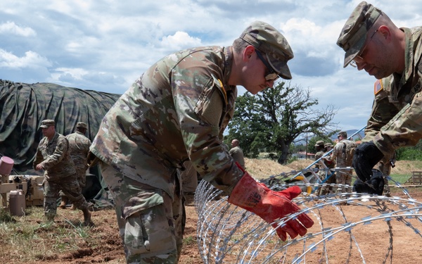 151st CBRN Battalion emplaces concertina wire during Immediate Response 25