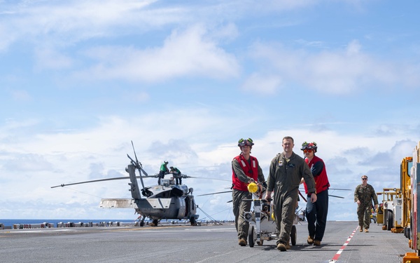 USS America (LHA 6) Conducts Aircraft Missile Upload