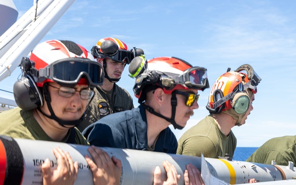 USS America (LHA 6) Conducts Aircraft Missile Upload