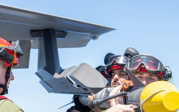 USS America (LHA 6) Conducts Aircraft Missile Upload