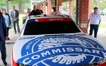 New DeCA-themed race car logo unveiled at Fort Gregg-Adams Commissary ahead of simulator’s 54-store tour