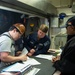 Contractors and Puget Sound Naval Shipyard workers conduct routine operations and ship maintenance aboard USS Ronald Reagan (CVN 76)