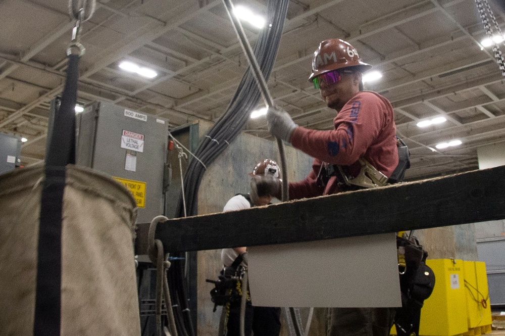 Contractors and Puget Sound Naval Shipyard workers conduct routine operations and ship maintenance aboard USS Ronald Reagan (CVN 76)