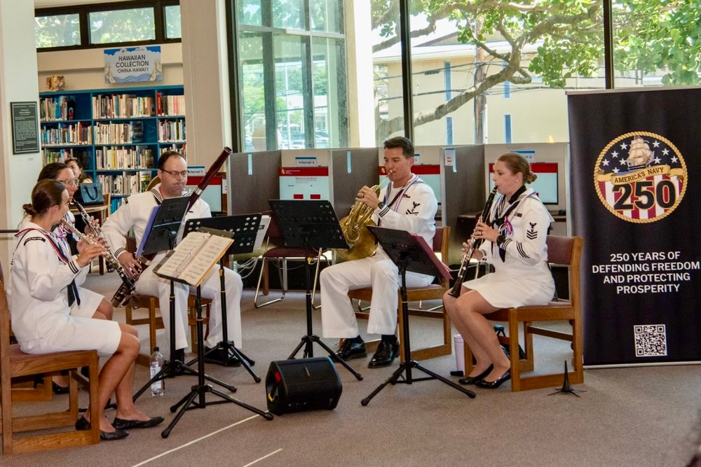 The US Pacific Fleet Band Woodwind Quintet performs at the Salt Lake- Moanalua branch of the Hawaii State Library System