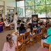 Musician 3rd Class Colin Walter gives a bassoon demonstration for audience members during a U.S. Pacific Fleet Band Woodwind Quintet performance  at the Salt Lake- Moanalua branch of the Hawaii State Library System.