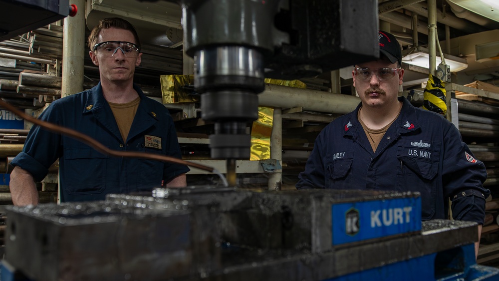 George Washington Sailors Work in the Machine Shop