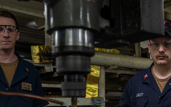 George Washington Sailors Work in the Machine Shop