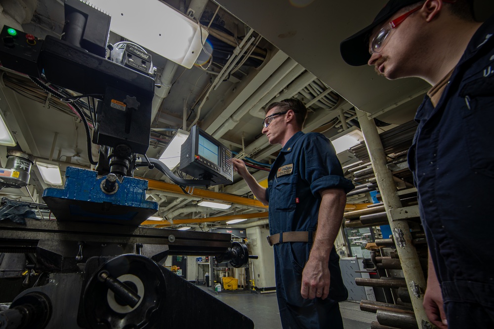George Washington Sailors Work in the Machine Shop