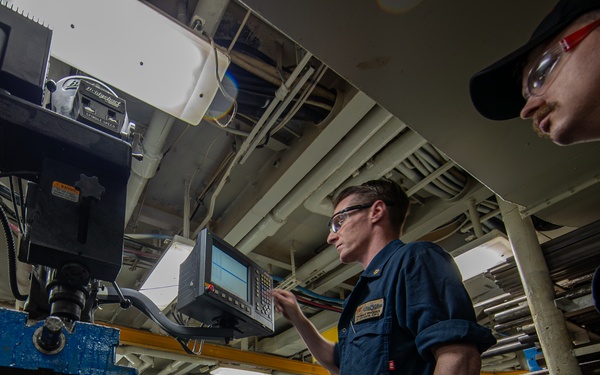 George Washington Sailors Work in the Machine Shop
