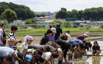 Rice-planting event near Camp Zama forges bond with neighboring community