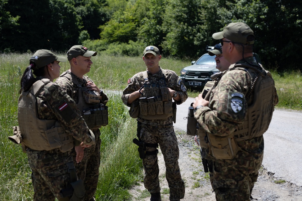 KFOR's Latvian soldiers conduct patrol along the ABL