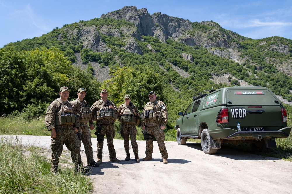 KFOR's Latvian soldiers conduct patrol along the ABL