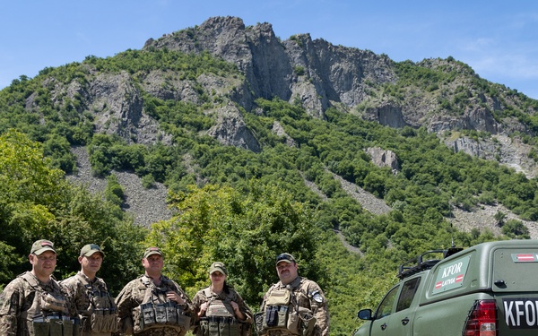 KFOR's Latvian soldiers conduct patrol along the ABL