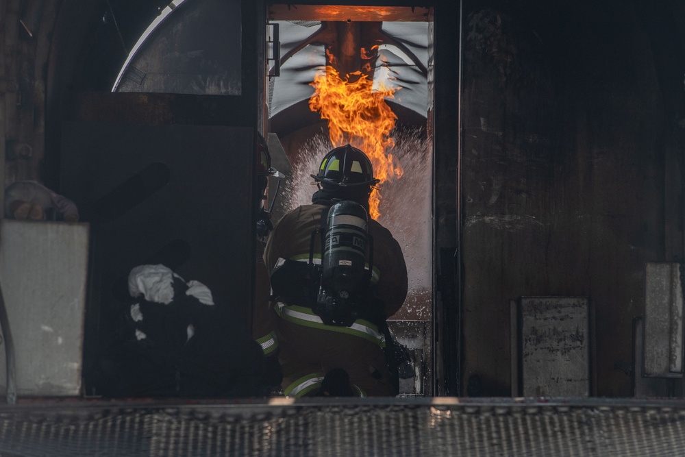 Fire Departments From the 101st Air Refueling Wing and 158th Fighter Wing Join Forces in Live Fire Training Exercise