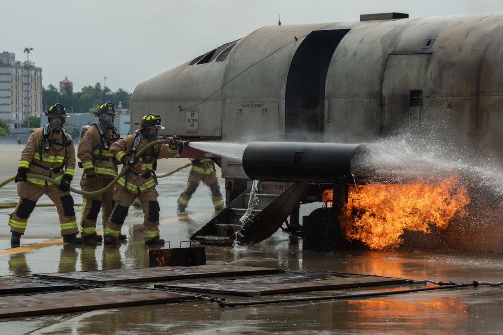 Fire Departments From the 101st Air Refueling Wing and 158th Fighter Wing Join Forces in Live Fire Training Exercise