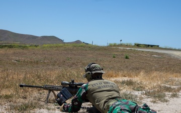 U.S. Marines, Indonesian Korps Marinir fire M107 .50-caliber special application scoped rifle