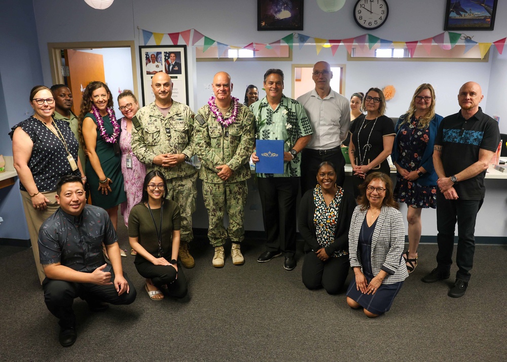Vice Adm. Brendan McLane meets with Military &amp; Family Support Center (MFSC) staff.