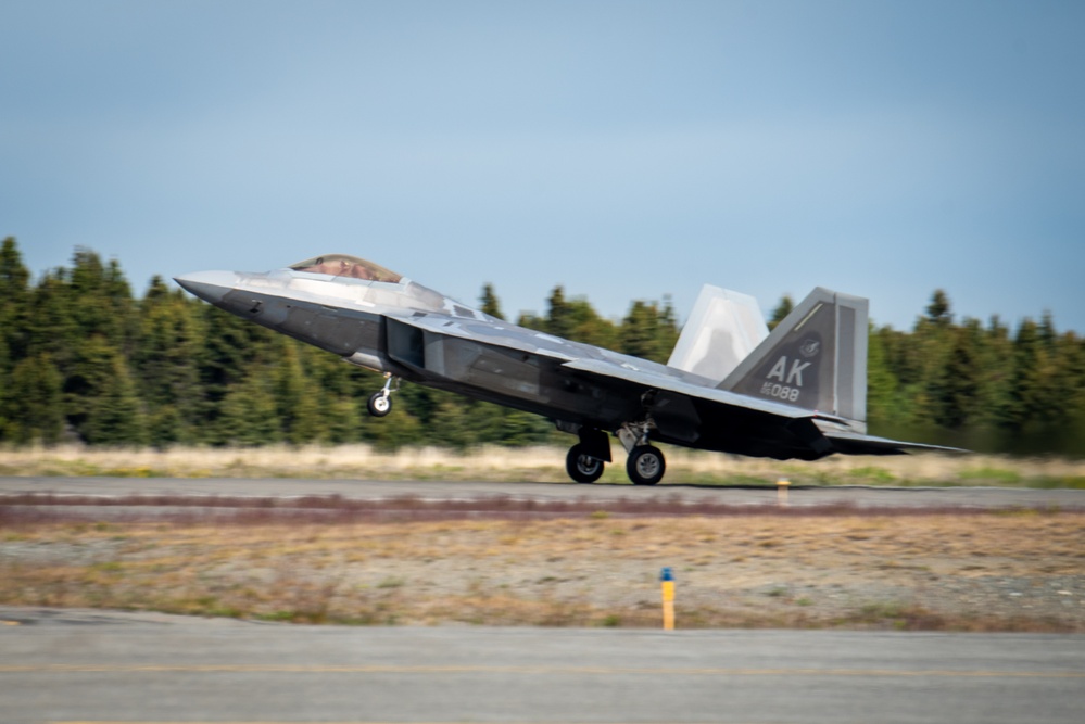 F-22 Raptors assigned to JBER conduct aerial maneuvers during exercise Tropic Tundra
